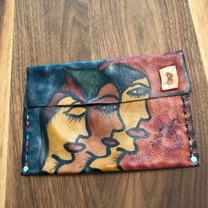 Small versatile multi colored envelope clutch.